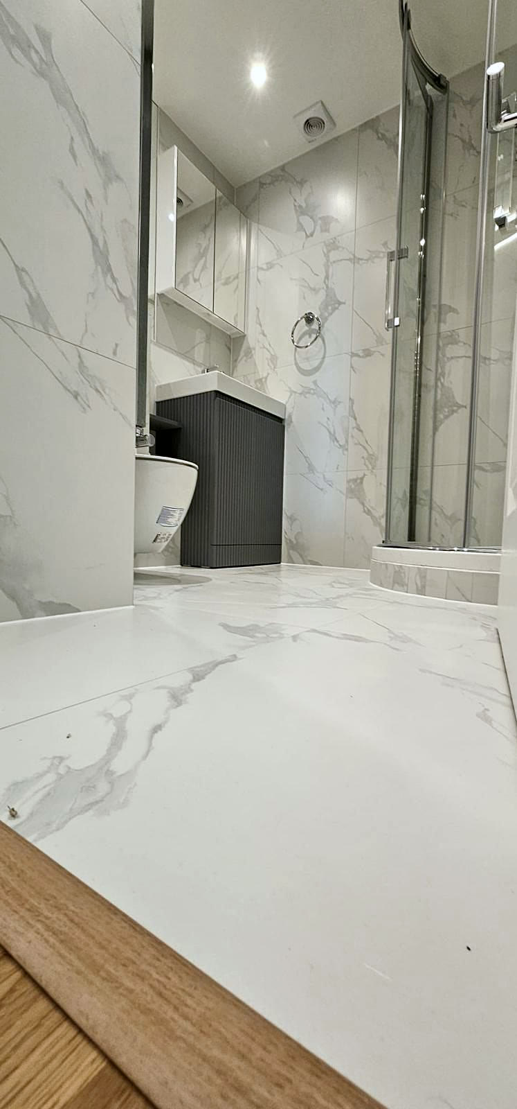 Marble-effect floor and wall tiling