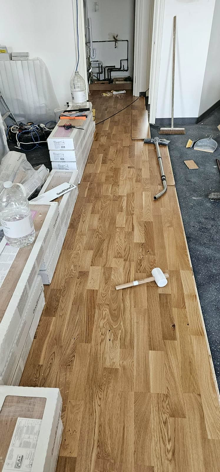 Engineered oak flooring being laid