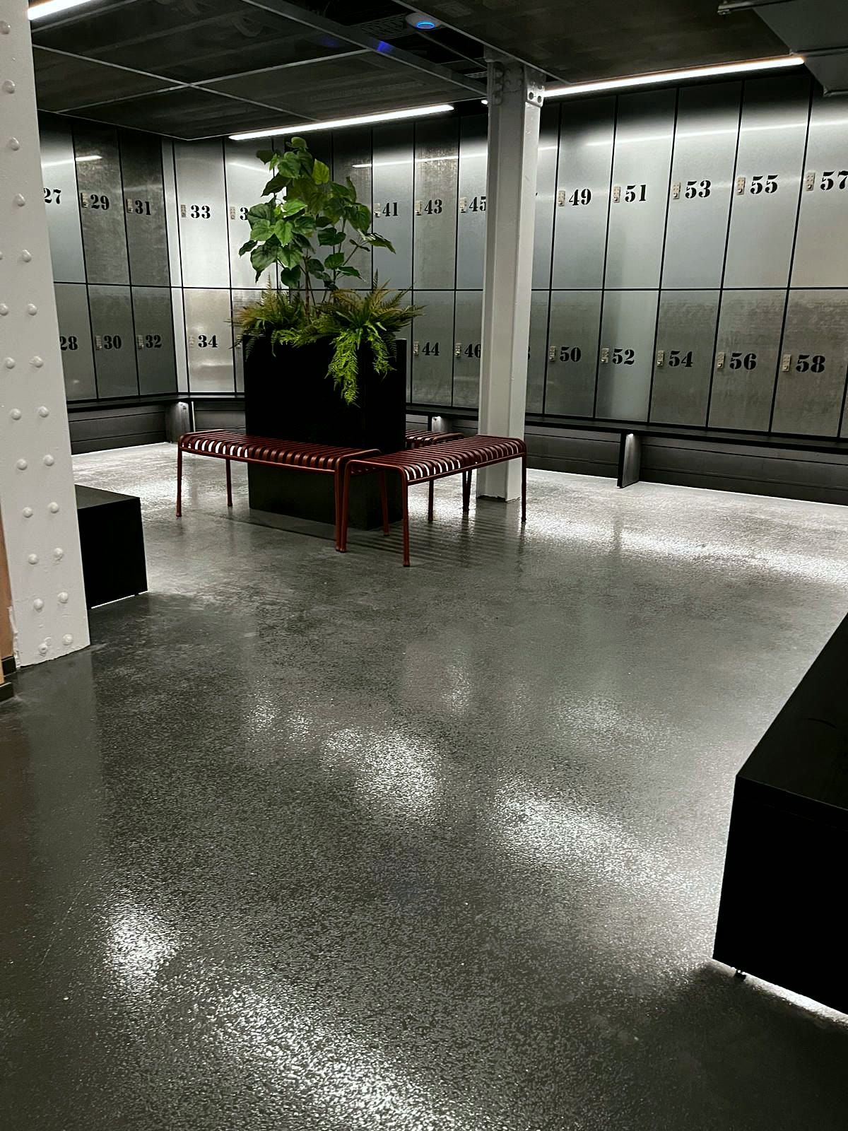 Seamless resin floor across the locker room