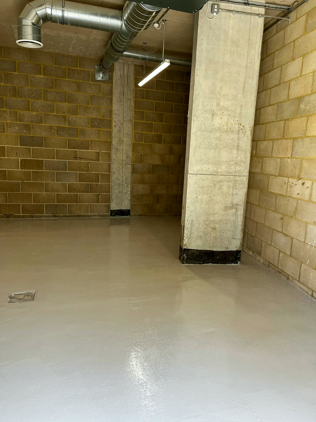 Painted concrete floor in a basement store