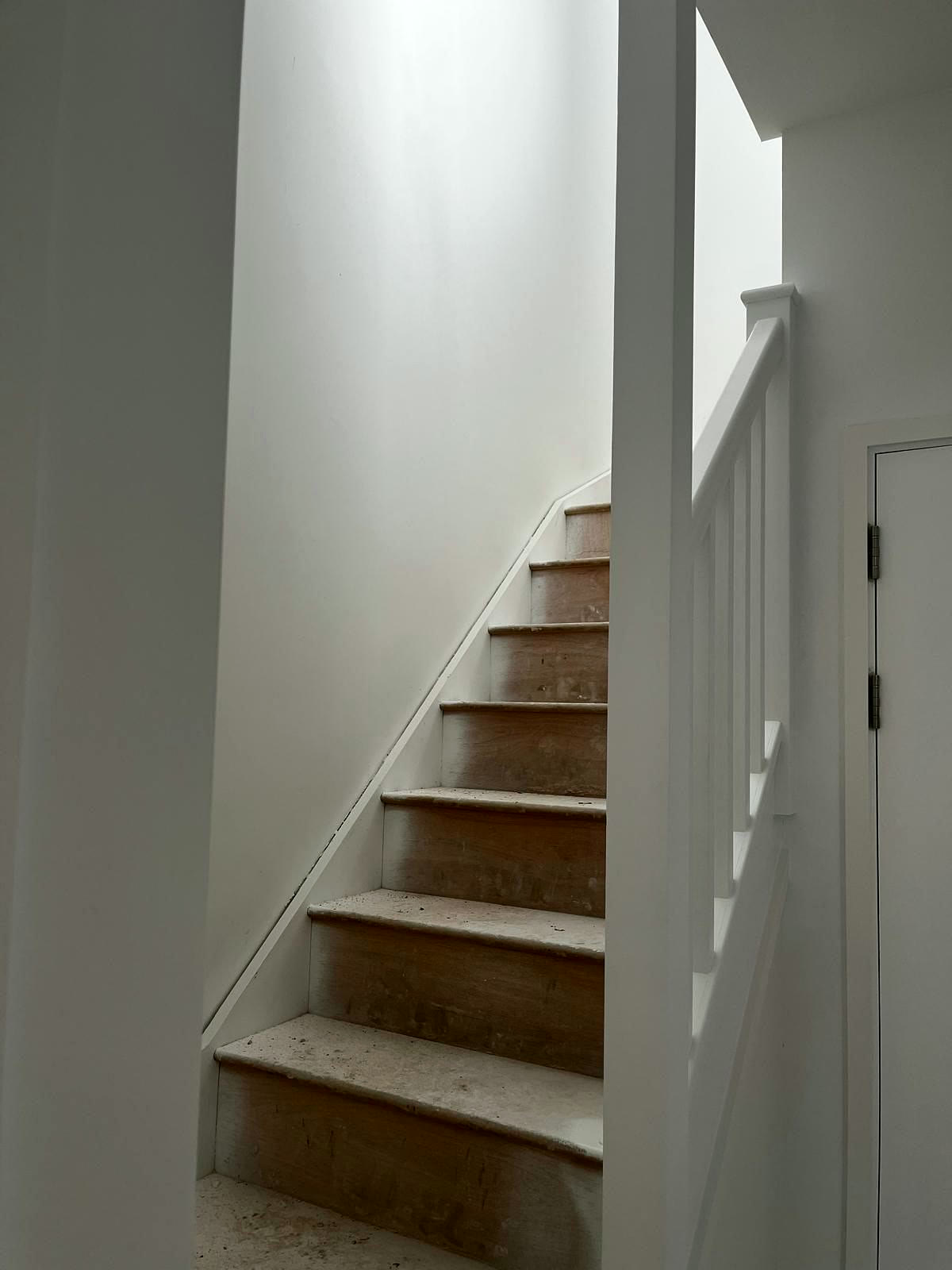 Painted staircase and walls in a new block